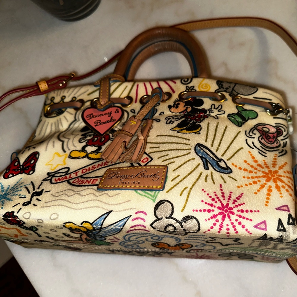 Dooney & Bourke Cream and Brown Shoulder Bag with Eclectic Design